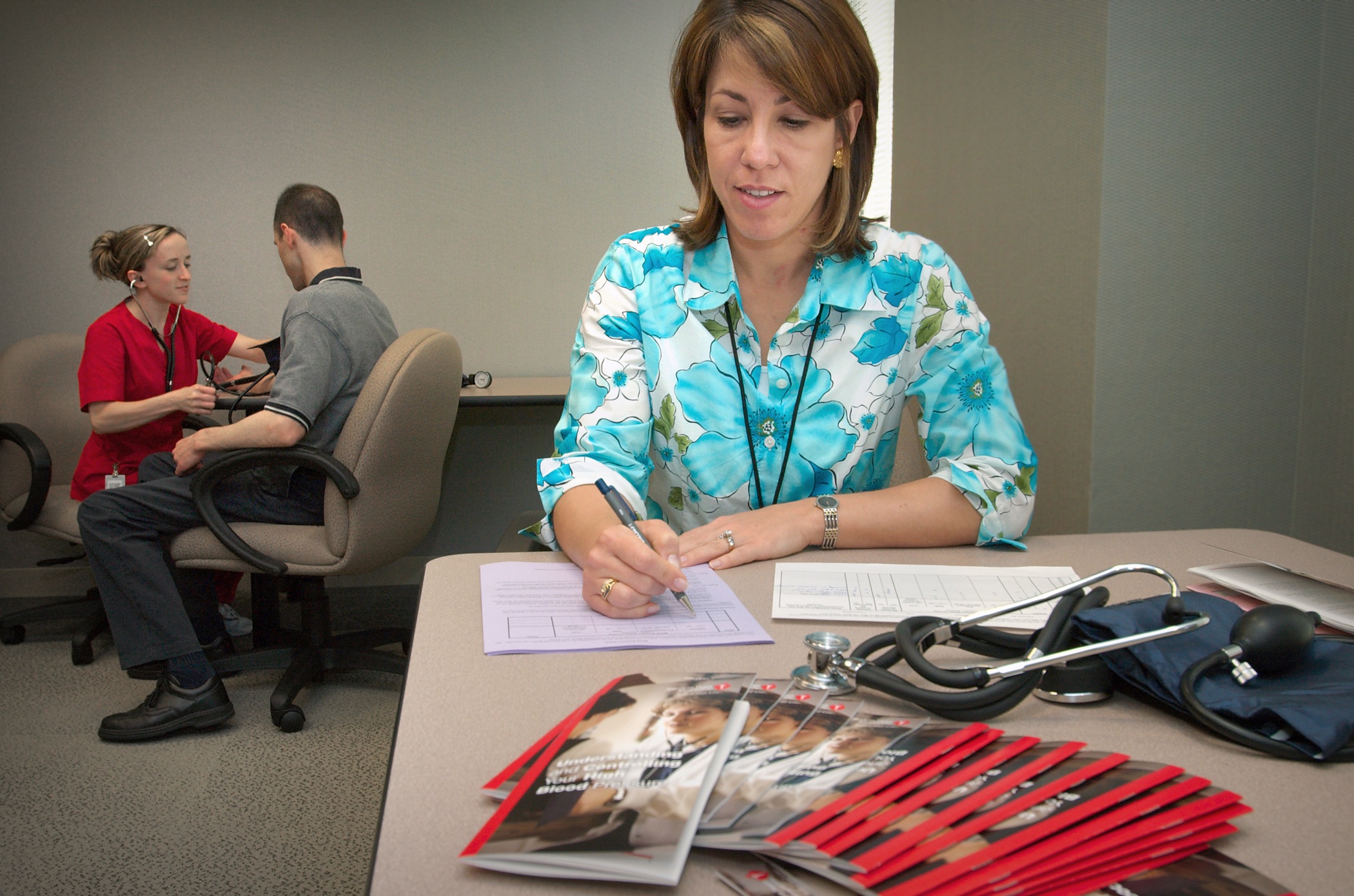 Extract data from MediTrax employee health record: Administrative nurse reviewing employee health records extracted from MediTrax